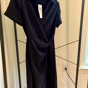 Calvin Klein size 10 black wrap dress. NWT.